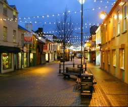 Market Street with Christmas lights and very few people