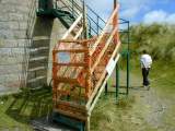 Blocked entrance to the Martello tower with Meg walking away