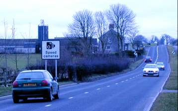 A speed camera sign