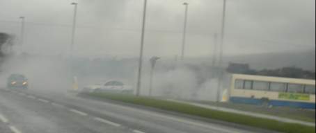 An Ulsterbus bus belching smoke