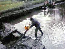One man with a bucket